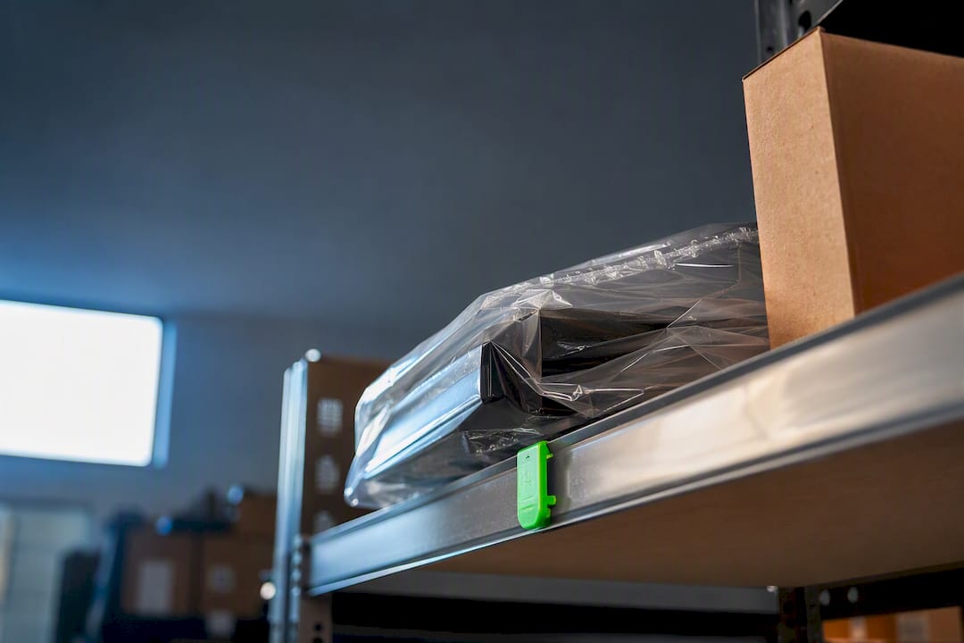 Sealed toner packaging stored on a shelf